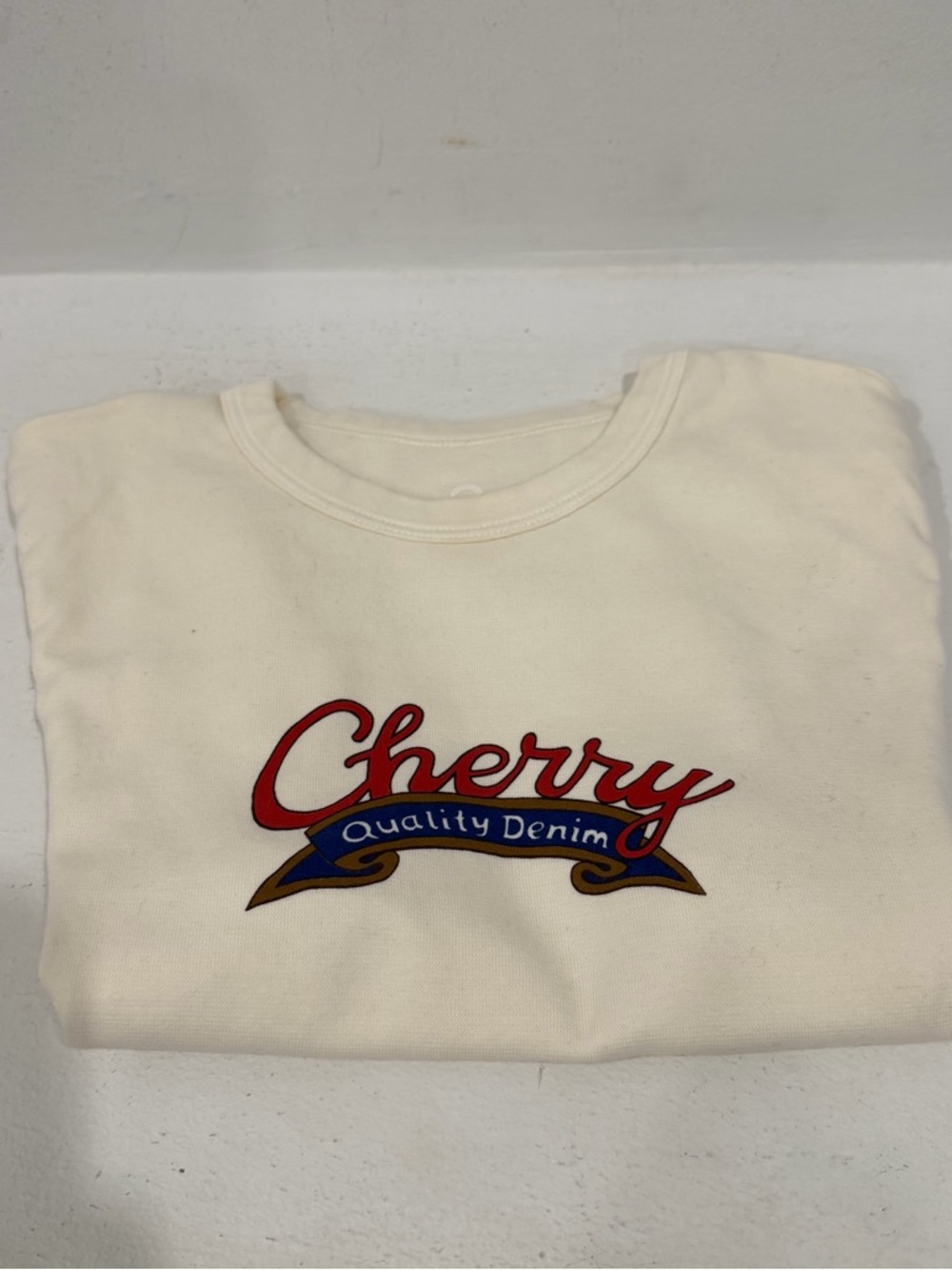 Cherry LA Cream Crop Top with Red Logo